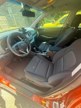 Orange 2017 Hyundai TUCSON SE