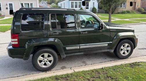 Green 2011 Jeep Liberty Sport