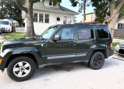 Green 2011 Jeep Liberty Sport