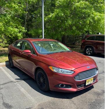 Red 2014 Ford Fusion SE