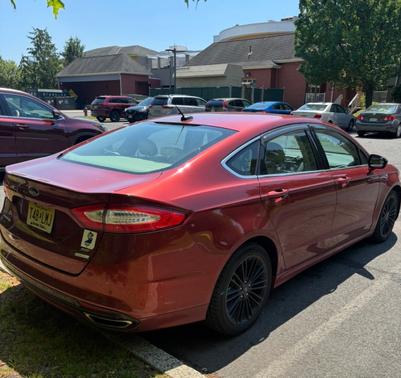 Red 2014 Ford Fusion SE