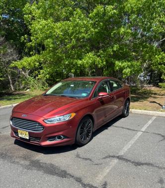 Red 2014 Ford Fusion SE