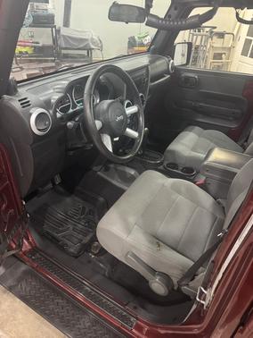 Red 2008 Jeep Wrangler Unlimited Sahara