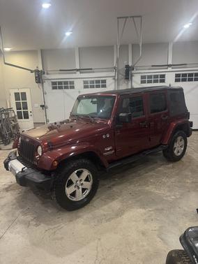 Red 2008 Jeep Wrangler Unlimited Sahara
