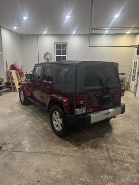 Red 2008 Jeep Wrangler Unlimited Sahara