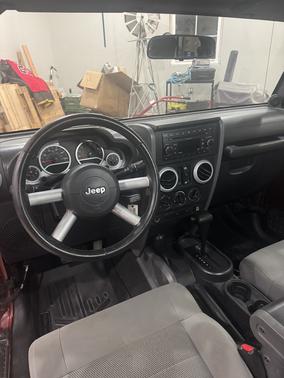 Red 2008 Jeep Wrangler Unlimited Sahara