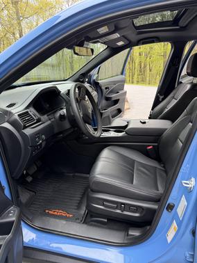 Blue 2025 Honda Passport TrailSport