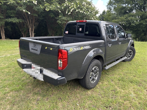 Gray 2014 Nissan Frontier Desert Runner