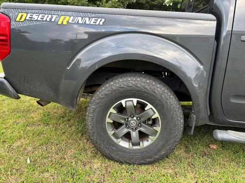 Gray 2014 Nissan Frontier Desert Runner