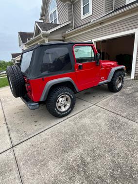 Red 2003 Jeep Wrangler Sport