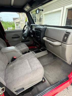 Red 2003 Jeep Wrangler Sport