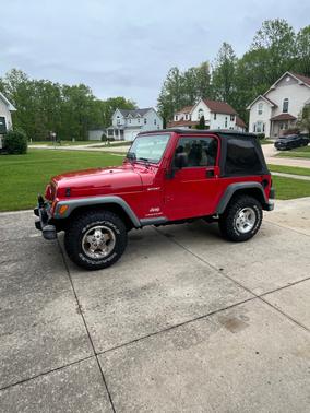 Red 2003 Jeep Wrangler Sport