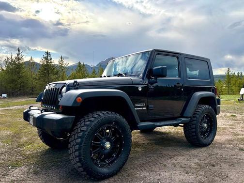 Black 2013 Jeep Wrangler Sport