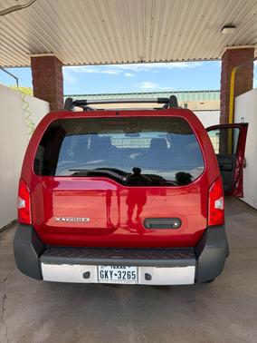 Red 2009 Nissan Xterra SE