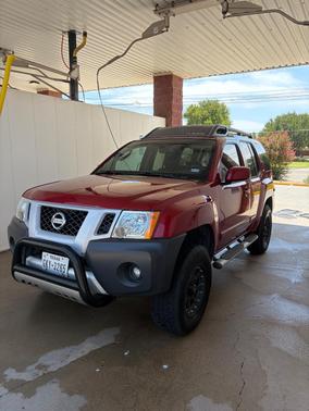 Red 2009 Nissan Xterra SE