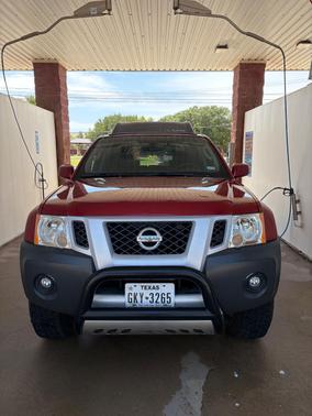 Red 2009 Nissan Xterra SE