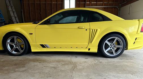 Yellow 2002 Ford Mustang GT