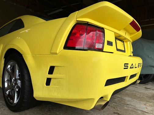 Yellow 2002 Ford Mustang GT