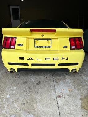 Yellow 2002 Ford Mustang GT
