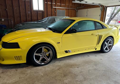 Yellow 2002 Ford Mustang GT