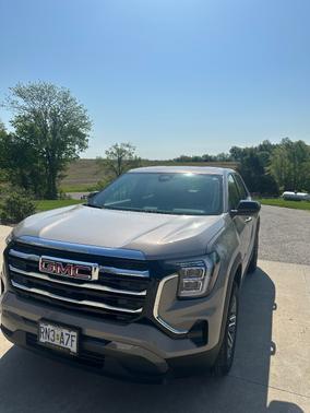 Beige 2026 GMC Terrain FWD Elevation