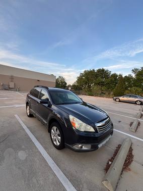 Black 2010 Subaru Outback 2.5 i Limited