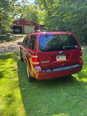 Red 2010 Ford Escape XLT