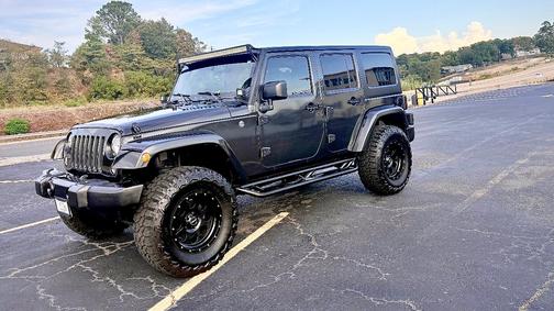 Gray 2016 Jeep Wrangler Unlimited Sahara