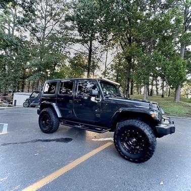 Gray 2016 Jeep Wrangler Unlimited Sahara