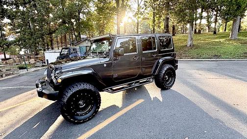 Gray 2016 Jeep Wrangler Unlimited Sahara