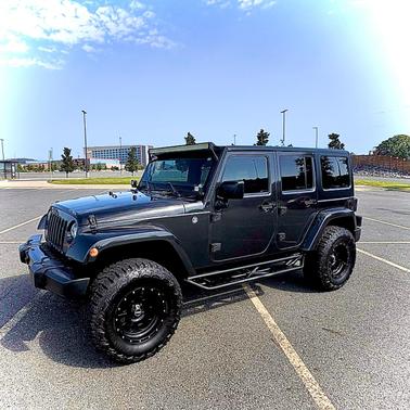 Gray 2016 Jeep Wrangler Unlimited Sahara