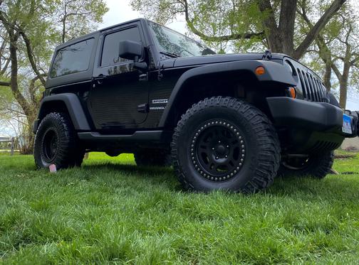 Photo 2 of 12 of 2011 Jeep Wrangler Sport