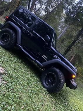 Photo 3 of 12 of 2011 Jeep Wrangler Sport