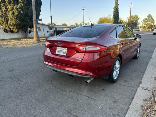 Red 2014 Ford Fusion SE