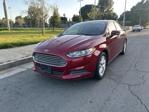 Red 2014 Ford Fusion SE