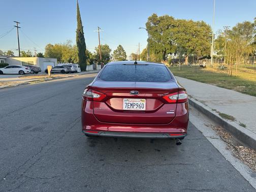 Red 2014 Ford Fusion SE