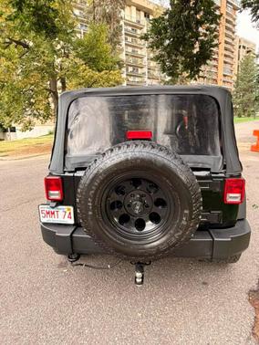 Black 2016 Jeep Wrangler Sport