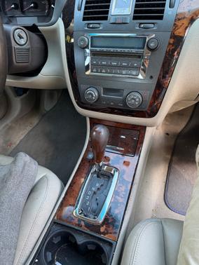 Beige 2010 Cadillac DTS Luxury Collection