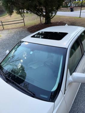 Beige 2010 Cadillac DTS Luxury Collection