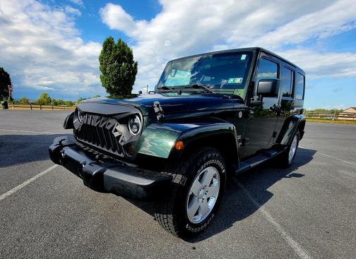 Green 2011 Jeep Wrangler Unlimited Sahara