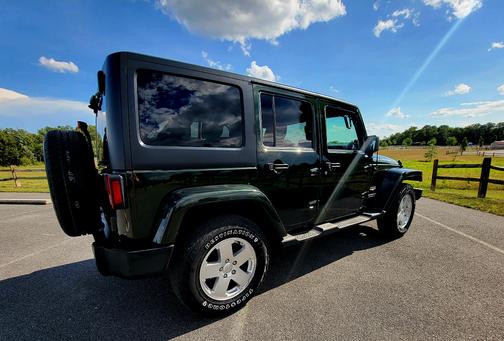 Green 2011 Jeep Wrangler Unlimited Sahara