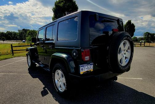 Green 2011 Jeep Wrangler Unlimited Sahara