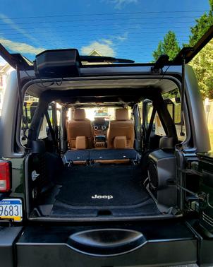 Green 2011 Jeep Wrangler Unlimited Sahara