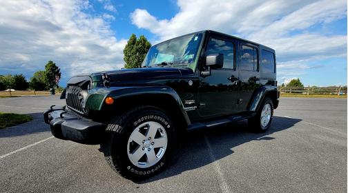 Green 2011 Jeep Wrangler Unlimited Sahara