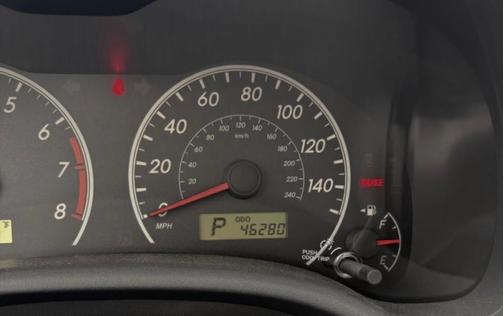 Beige 2012 Toyota Corolla LE