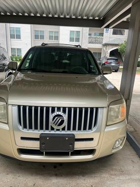 Gold 2010 Mercury Mariner Premier