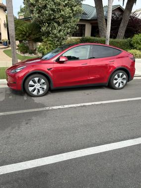 Red 2023 Tesla Model Y Long Range