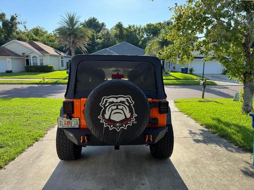 Orange 2012 Jeep Wrangler Unlimited Rubicon