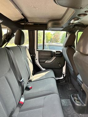 White 2018 Jeep Wrangler JK Unlimited Sport