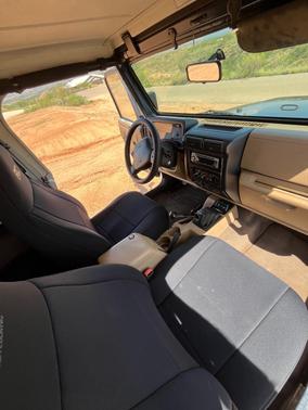 Blue 2000 Jeep Wrangler Sport